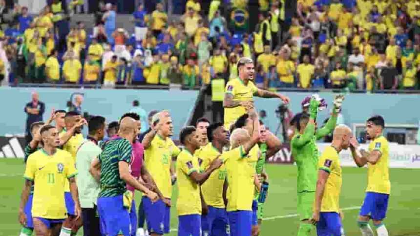 Brazil's players celebrate at the end of the World Cup round of 16 soccer