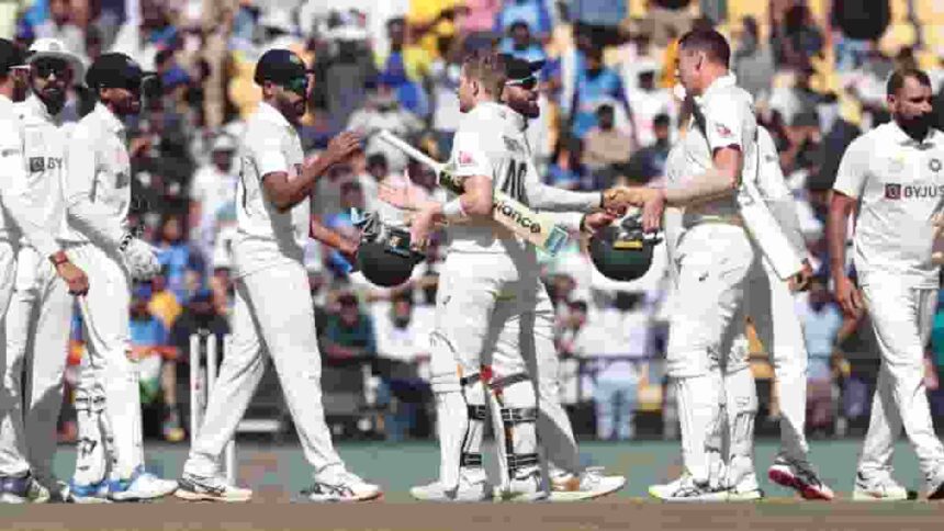 Australia's Scott Boland and Steve Smith,shake hands with Indian players after India won the first cricket test match against Australia in Nagpur,on Saturday