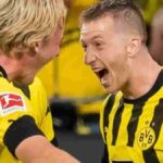 In-form Borussia Dortmund keep advancing