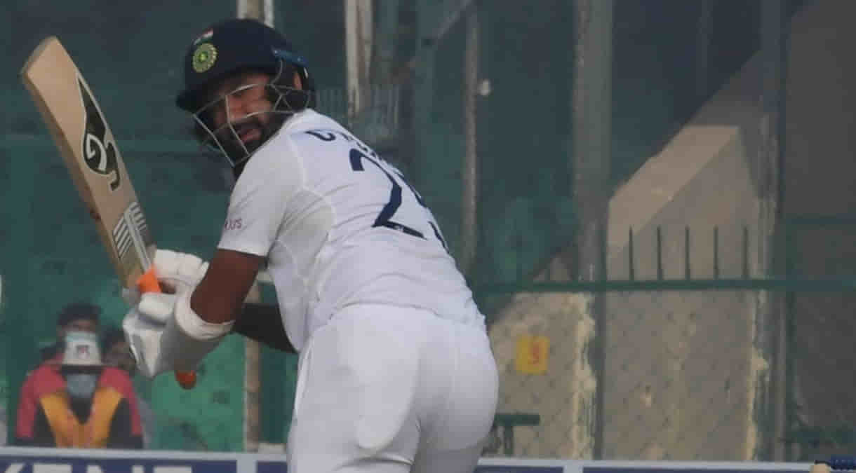 India's Cheteshwar Pujara plays a shot during the day four of their first test cricket match with New Zealand in Kanpur, in New Delhi (PHOTOSUMAN CHATTOPADHYAY)