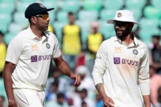 Jadeja and Ashwin leave the field after the end of Australia's innings during the first day of the first cricket test match between India and Australia in Nagpur. (