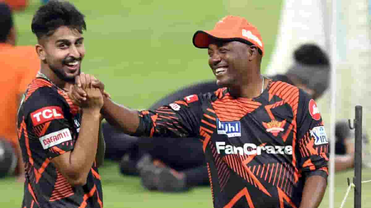 Kolkata SRH's Umran Malik with coach Brian Lara during a practice session ahead of their match against Sunrisers Hyderabad, at Eden Gardens in Kolkata on Thursday, April 13, 2023. (Photo IANS)