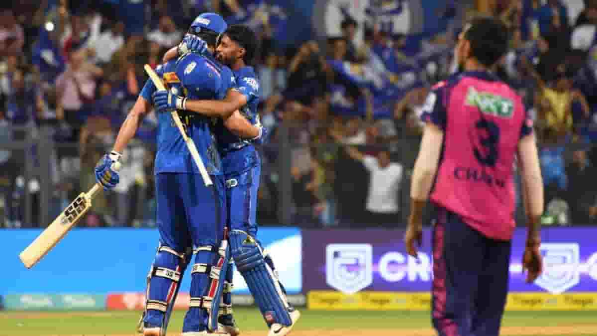 Mumbai MI's Tim David with Tilak Varma celebrate after Mumbai Indians win the IPL 2023 match against Rajasthan Royals at Wankhede Stadium, in Mumbai, on Sunday, April 30, 2023. (PhotoIANS)
