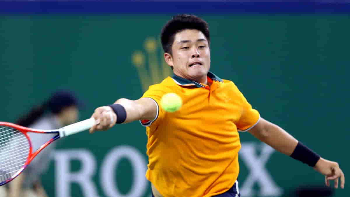 SHANGHAI, Oct. 10, 2018 (Xinhua) -- China's Wu Yibing hits a return during the men's singles second round match against Japan's Kei Nishikori
