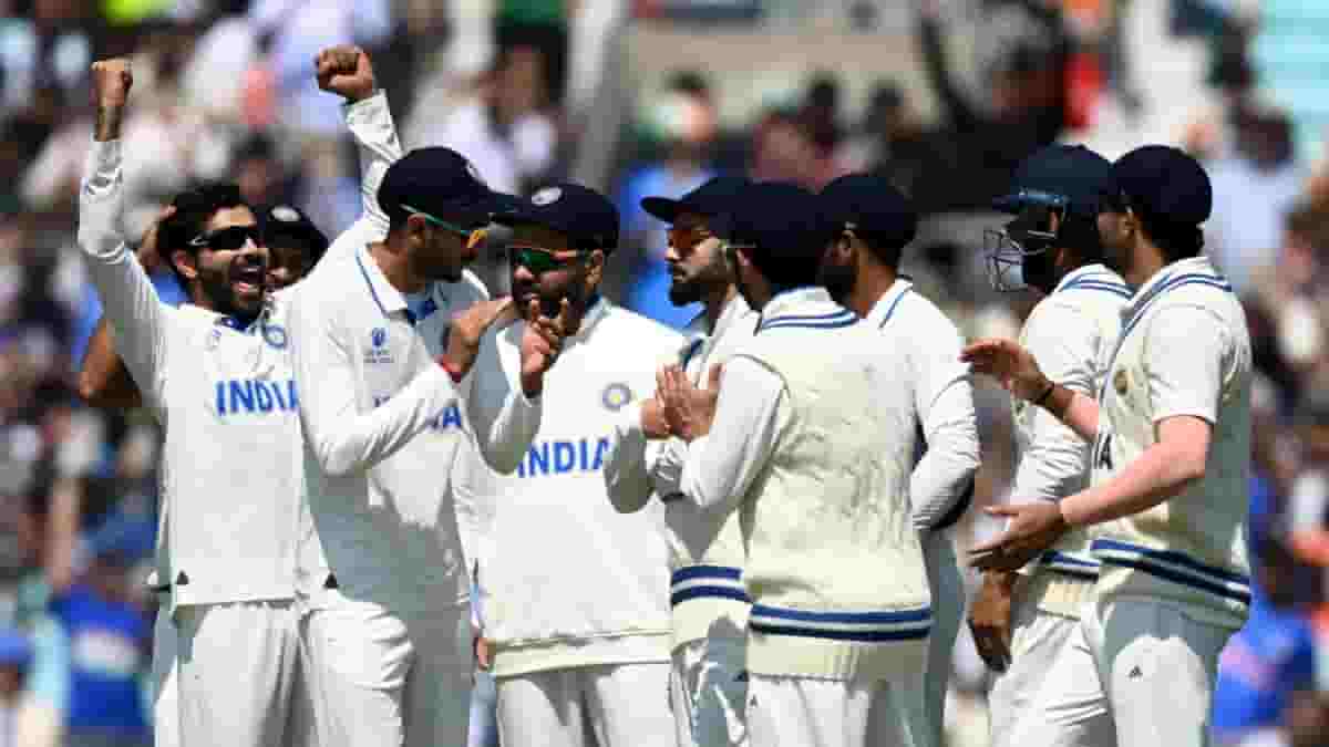 India's Ravindra Jadeja with teammates celebrate the dismissal of Australia's Alex Carey on the second day of the ICC World Test Championship Final