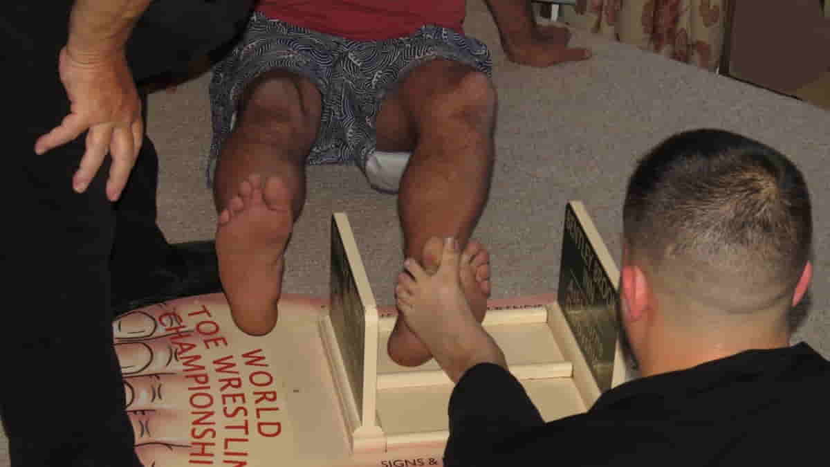 Toe Wrestling (Photo source: Calendar & Customs)