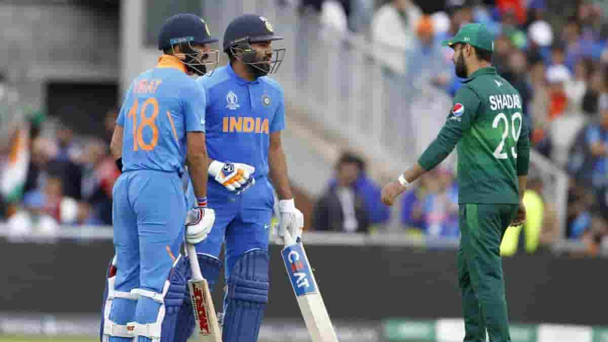 Indian skipper Virat Kohli and Rohit Sharma during the 22nd match of 2019 World Cup between India and Pakistan at Old Trafford in Manchester, England on June 16, 2019. (Photo Surjeet YadavIANS)