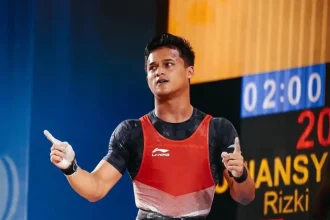 Weightlifting Worlds: Indonesia's Rizki Juniansyah Clinches Two Golds, New World Record